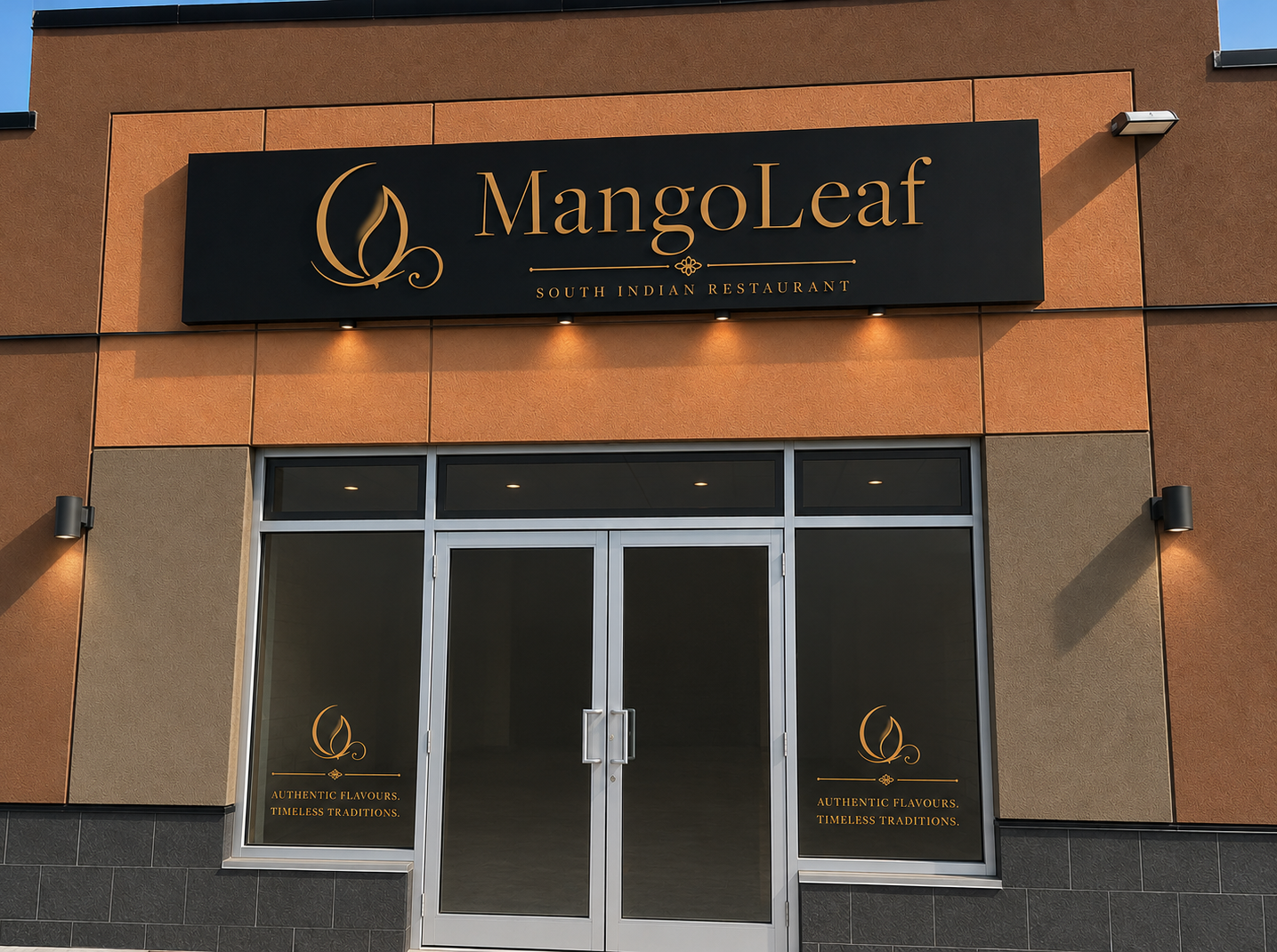 MangoLeaf storefront with illuminated gold signage at dusk